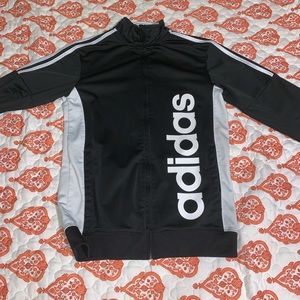 A Adidas zip up jacket.